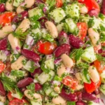 Mediterranean Bean Salad Recipe with kidney beans, white beans, cucumber, tomatoes, and fresh herbs tossed in a lemon olive oil dressing