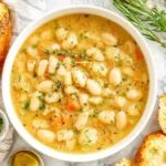 Creamy butter bean soup with herbs and crusty bread
