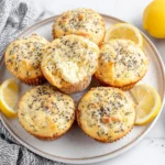 Lemon Chia Seed Muffins top view with lemon slices and chia seeds on plate