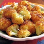 Crispy Parmesan Cauliflower Bites roasted to golden perfection with cheesy coating and seasoned edges