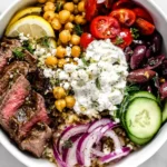 Easy Mediterranean Steak Bowl Recipe with grilled steak, chickpeas, feta, and fresh vegetables