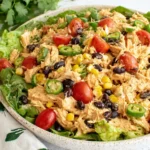 Quick Southwest Chicken Salad with shredded chicken, black beans, corn, tomatoes and jalapeño slices