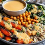 One-Pan Roasted Carrot and Chickpea Bowl with quinoa and tahini dressing