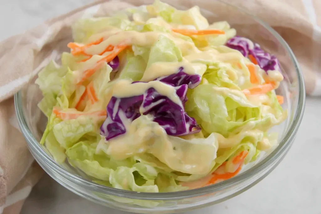 Bowl of crunchy cabbage salad with homemade Teriyaki Salad Dressing