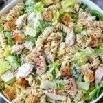 Fresh Chicken Caesar Pasta Salad with grilled chicken, rotini pasta, romaine, and crispy croutons