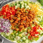 Honey Hot Chicken Salad with chopped romaine, diced vegetables, and buffalo honey chicken