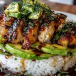 Honey Lime Chicken & Avocado Rice Stack Recipe topped with herbs and diced avocado