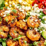Honey Lime Shrimp Salad with sweet corn, avocado slices, and tangy lime dressing