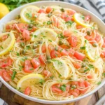 Lemon Capellini Salad with fresh tomatoes parsley and lemon slices