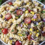 Creamy Southwest Pasta Salad with chicken, black beans, corn, and cherry tomatoes