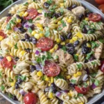 Southwest Pasta Salad with grilled chicken, black beans, corn, and cherry tomatoes in creamy dressing
