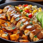 BBQ Chicken & Roasted Sweet Potato Bowls topped with avocado, quinoa, and roasted sweet potatoes
