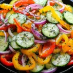 Cucumber Sweet Pepper Salad with fresh cucumbers, colorful bell peppers, red onion, and dill in a light homemade dressing