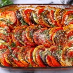 Easy Ratatouille Recipe baked until tender with roasted vegetables, herbs, and a light Parmesan topping