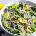 Lemon Parmesan Lettuce Salad Recipe served with fresh lemon, parmesan, romaine lettuce, and sliced red onions