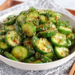 Viral Asian Cucumber Salad TikTok Recipe with crunchy cucumbers, sesame seeds, and chili oil