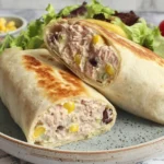 Healthy Tuna Melt Wrap Recipe with melted cheese, tuna salad, sweet corn, and crisp lettuce served on a plate