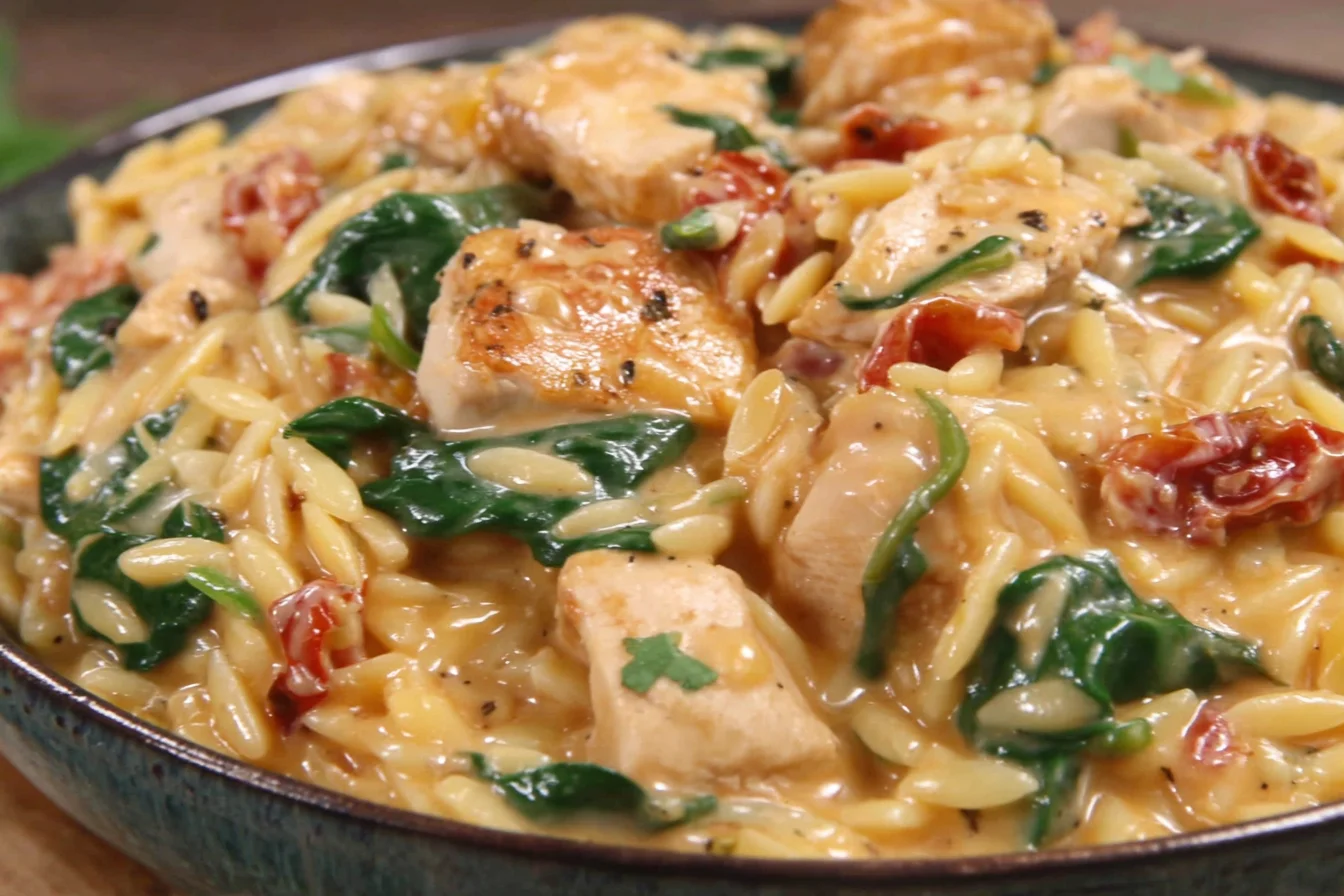 One Pan Marry Me Chicken Orzo served with creamy orzo, chicken breast pieces, spinach, and sun-dried tomatoes