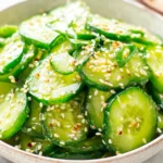 Sunomono (Japanese Cucumber Salad) with sesame seeds and scallions in a light rice vinegar dressing