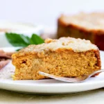 Vegan Jamaican Sweet Potato Pudding with traditional custard topping and warm cinnamon