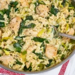 Close-up of Chicken Asparagus and Boursin Orzo with creamy sauce, juicy chicken pieces, and tender leeks and asparagus