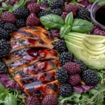 Blackberry Basil Grilled Chicken Salad with sliced grilled chicken, fresh blackberries, avocado, basil leaves, and balsamic dressing