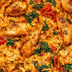 Creamy Cajun Chicken Orzo with seared chicken, spinach, and sun-dried tomatoes in a rich one-pan sauce