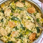 Chicken Asparagus and Boursin Orzo in skillet with creamy sauce, tender chicken, and fresh asparagus