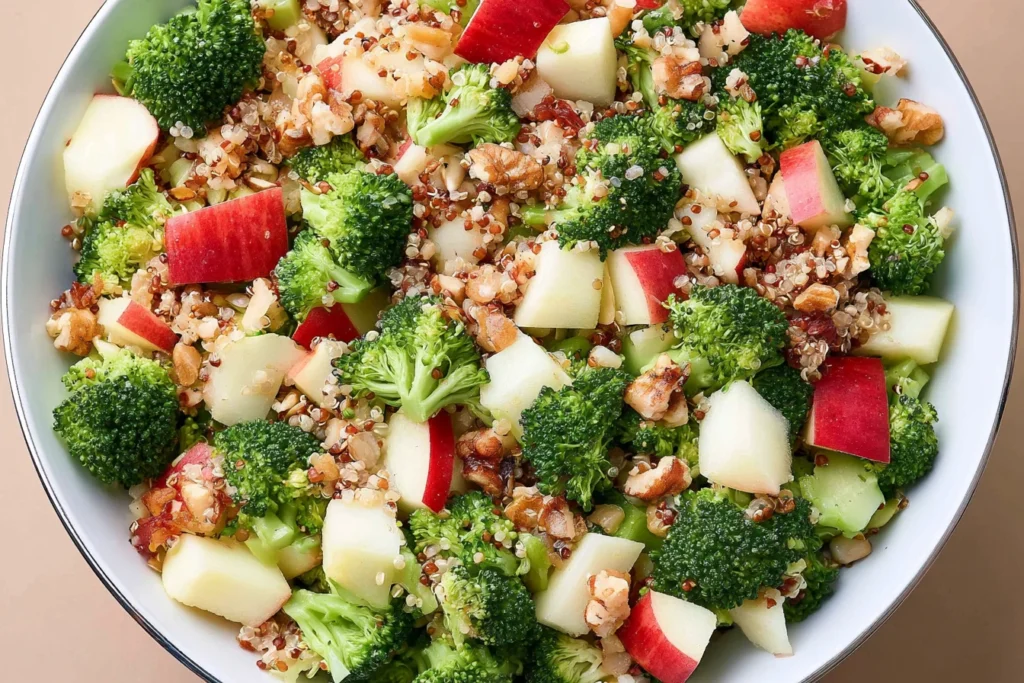 Broccoli Apple Quinoa Salad with fresh broccoli, crisp apples, quinoa, and toasted nuts in a healthy honey mustard dressing