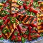 Grilled Halloumi Watermelon Salad with golden grilled halloumi, caramelized watermelon, fresh mint, and sliced jalapeños