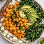 Peanut Chickpea & Veggie Bowls with creamy peanut chickpeas, jasmine rice, sautéed kale, and sliced avocado in a nourishing bowl