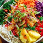 Thai Sweet Chili Chicken Buddha Bowls with quinoa, fresh veggies, pineapple, and sesame chili dressing
