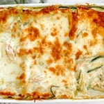 Chicken Alfredo Zucchini Lasagna with shredded chicken, creamy Alfredo sauce, zucchini layers, and golden melted mozzarella.