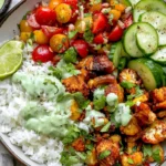 Cauliflower Shawarma Bowls with roasted cauliflower, basmati rice, cucumber, tomatoes, fresh herbs, and creamy green tahini sauce