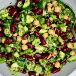 Simple Kidney Bean Salad with kidney beans, chickpeas, crisp cucumber, green onions, and fresh herbs tossed in a zesty dressing.