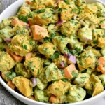 Easy Creamy Curry Chicken Salad with tender chicken, carrots, celery, red onion, and fresh cilantro coated in a creamy curry yogurt dressing.