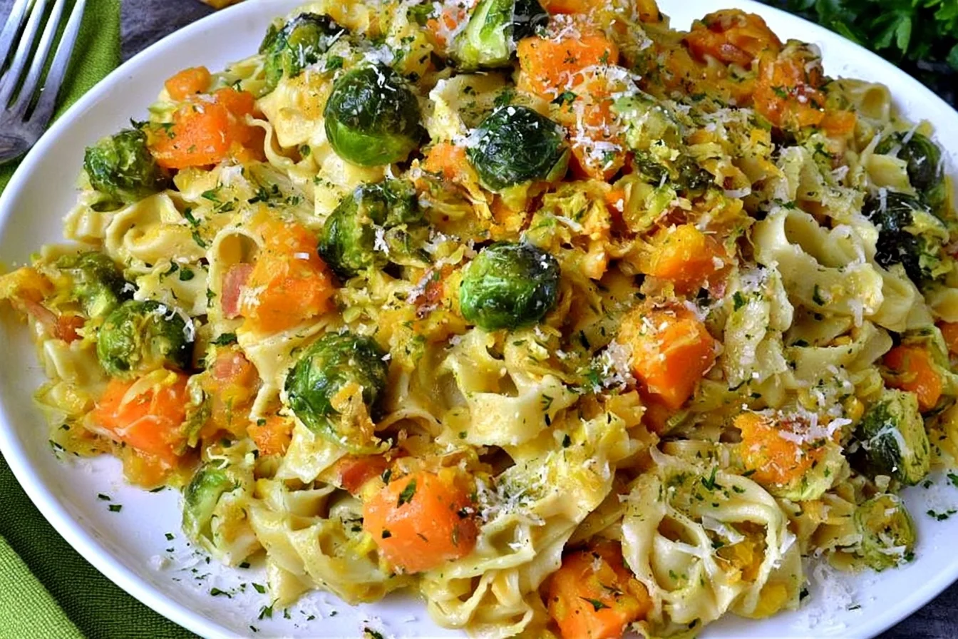 Squash and Sprouts Butter Parmesan Pasta with roasted Brussels sprouts, butternut squash, Parmesan cheese, and fresh herbs.